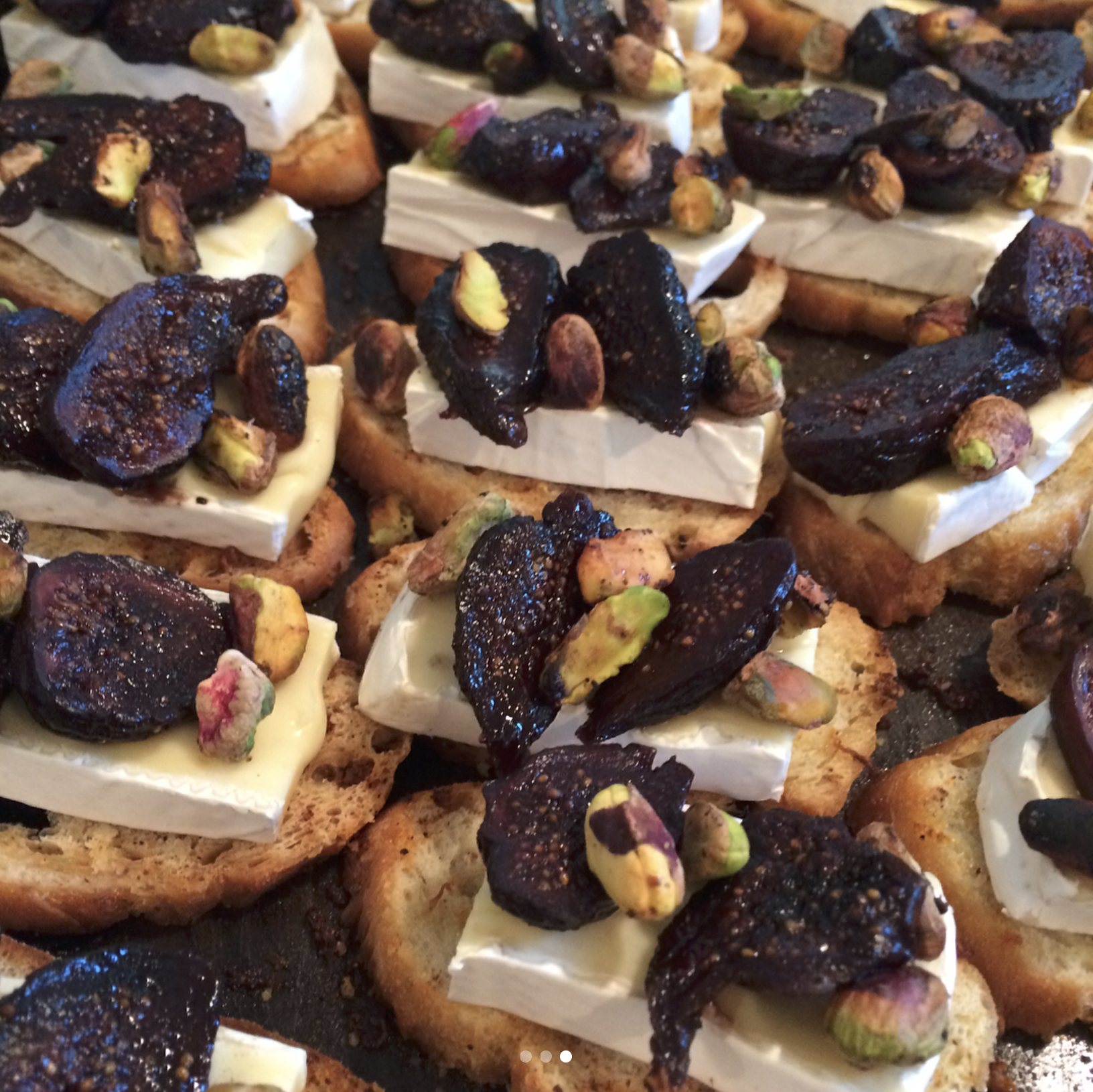 Baked brie crostini with fig and pistachio, from Little Goat catering.